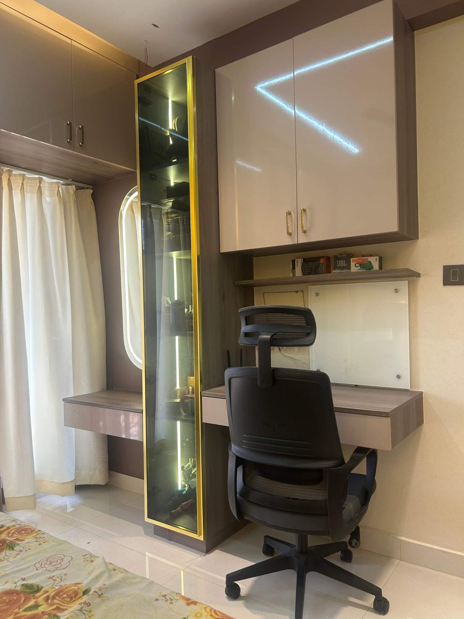 Modern modular master bedroom interior with study workspace, dressing table with mirror, and wardrobe storage designed by Olangana Design’s.
