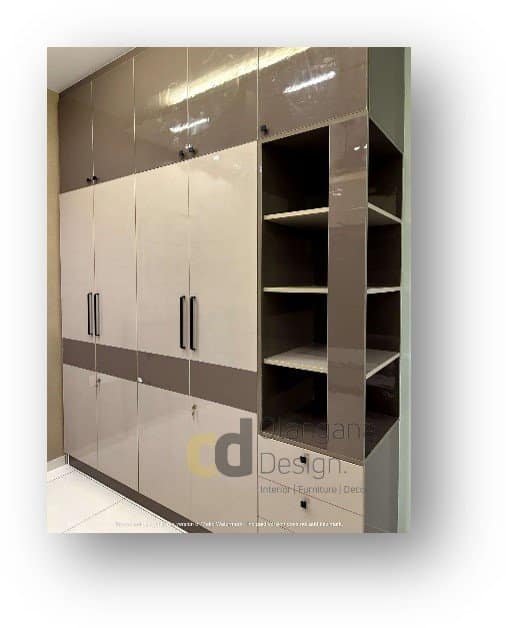 Modern glossy wardrobe design by Olangana Design, offering ample storage for contemporary interior in Bangalore.