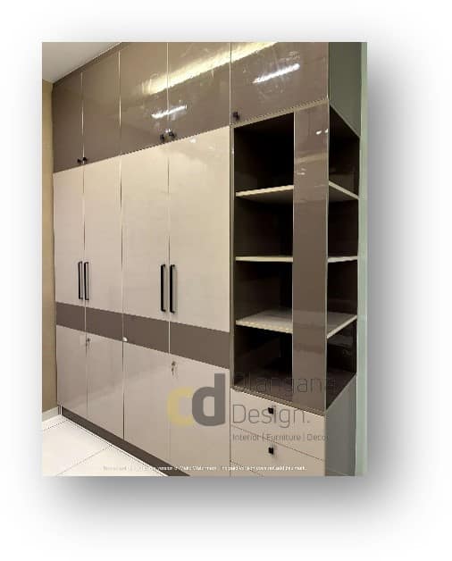 Modern glossy wardrobe design by Olangana Design, offering ample storage for contemporary interior in Bangalore.