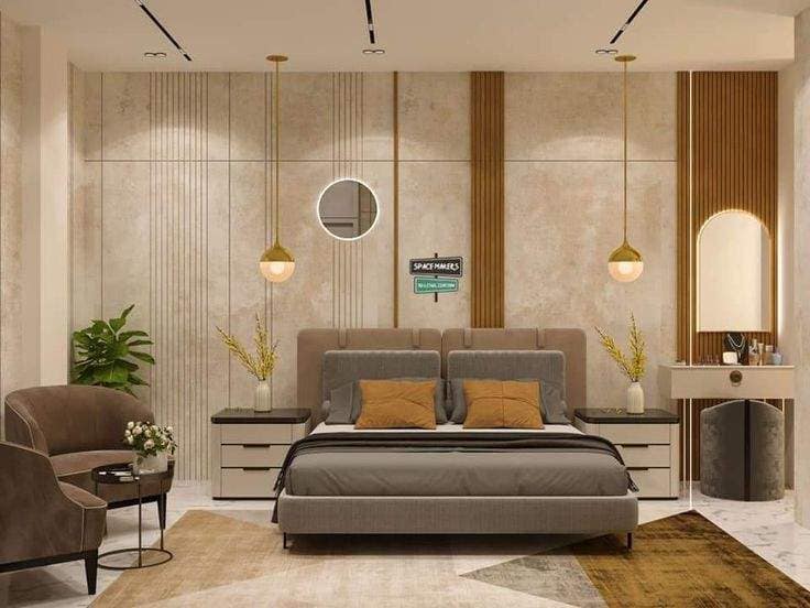 Modern bedroom interior design featuring textured walls, gold pendant lights, and a plush bed, expertly crafted by Olangana Design in Bangalore.