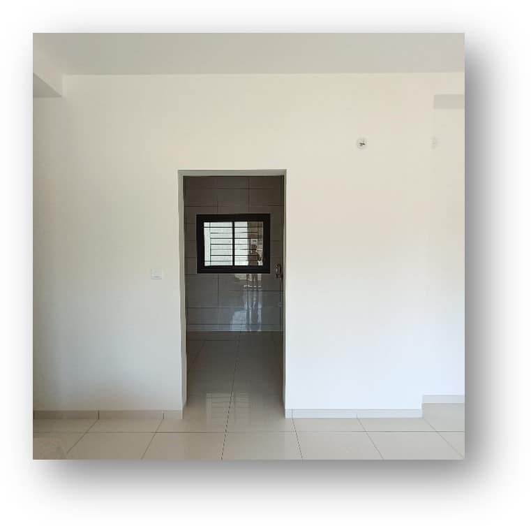 Bare shell apartment in Bangalore, ready for modern interior transformation by Olangana Design, showcasing the initial phase of a project.
