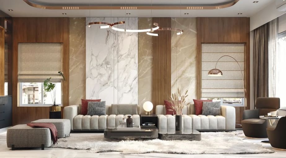 Luxurious modern living room interior design by Olangana in Bangalore, featuring elegant channel-tufted sofas, a striking marble and wood feature wall, and contemporary lighting fixtures.