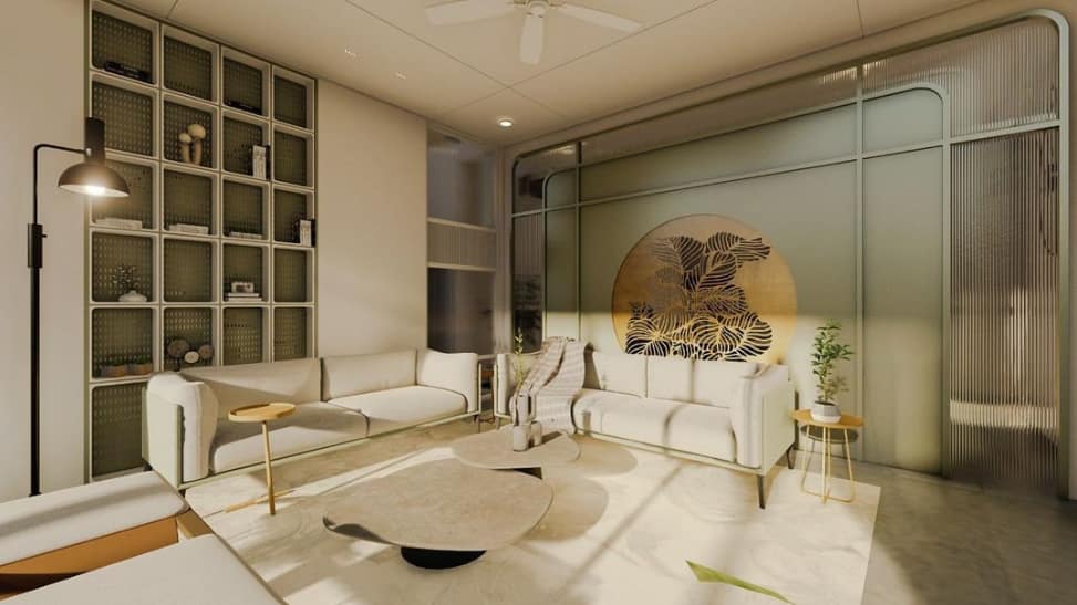 Modern living room interior design by Olangana in Bangalore, featuring cream sofas, a modular display unit, elegant gold leaf wall art, and fluted glass partitions in a serene green and cream palette.